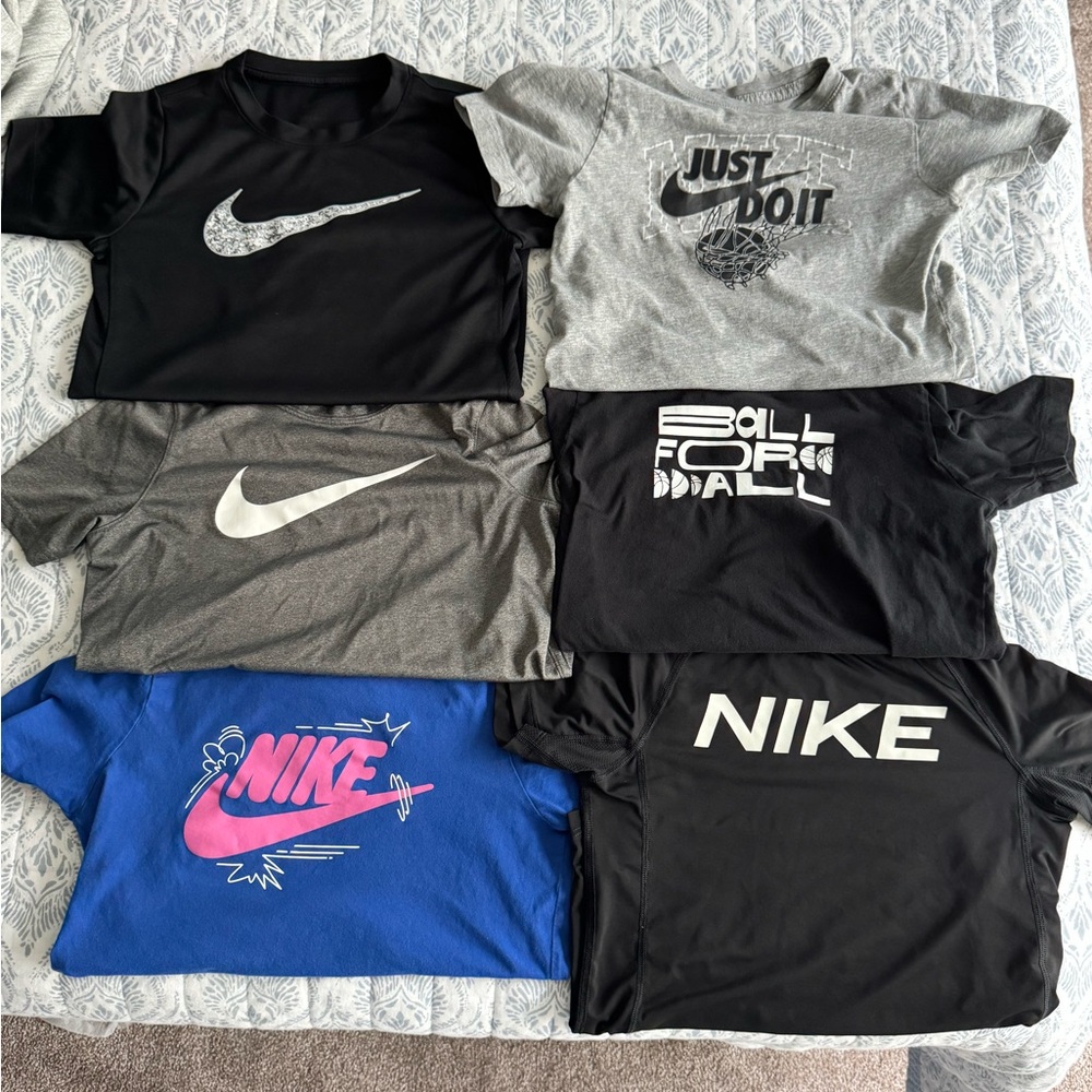 Nike Youth Medium Short Sleeve Tees.  Total of 16 shirts.